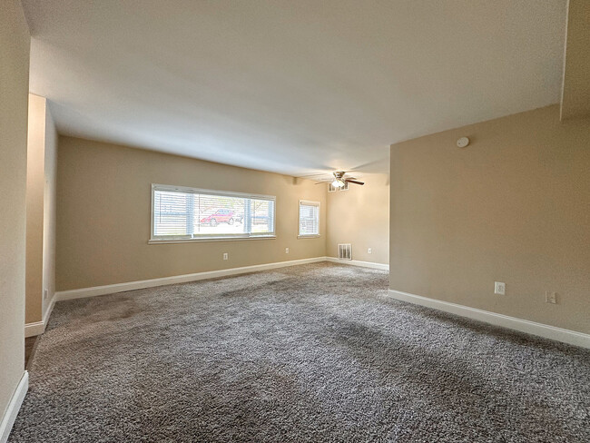 Carpeted Living Room - Springfield Valley Apartments