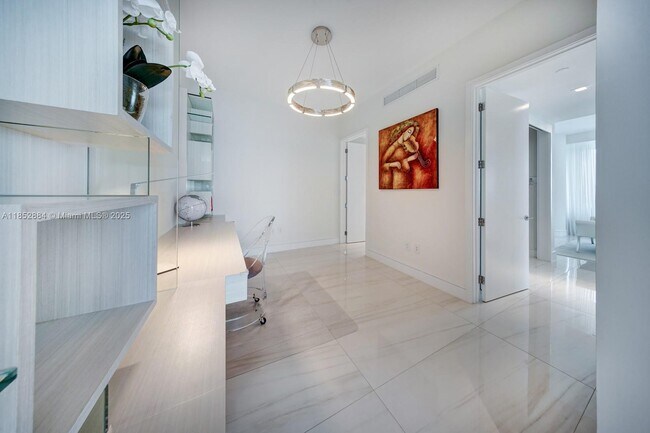 Building Photo - 10203 Collins Ave