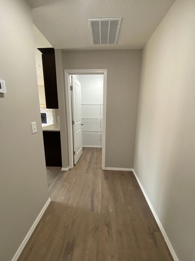 Building Photo - Comfortable four-bedroom home.