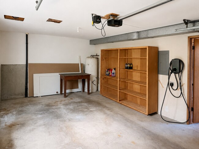 Building Photo - Beautiful Split-Level Home with Fireplace, Deck, Garage, and EV Charger