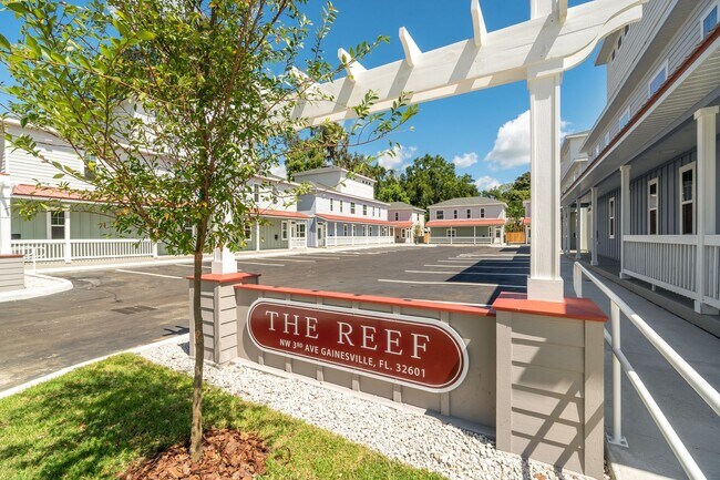 Building Photo - The Reef Townhome NOW LEASING FOR FALL 2026!