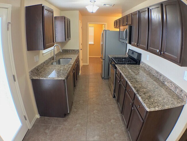 Building Photo - Northeast El Paso 4 Bed Refrig A/C