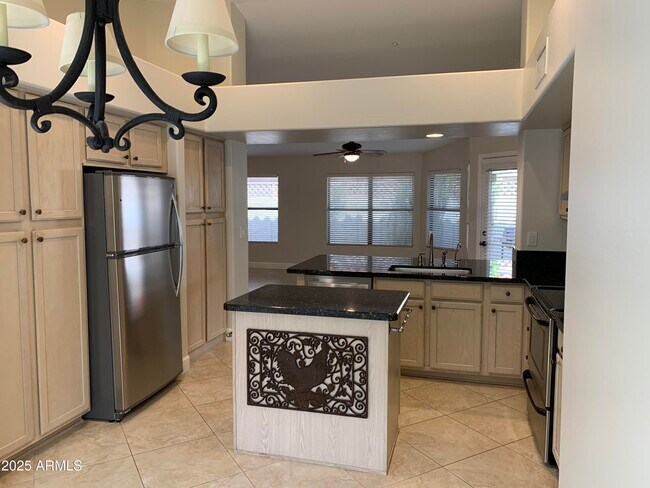 Building Photo - 8889 E Aster Dr