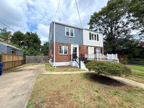 Building Photo - Charming 2BR Townhome with Finished Basement, Fenced Yard & Private Driveway Near Huntington Metro