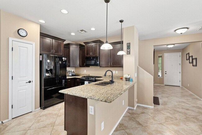 Building Photo - Welcome Home! This stunning 4 bedroom, 3 b...