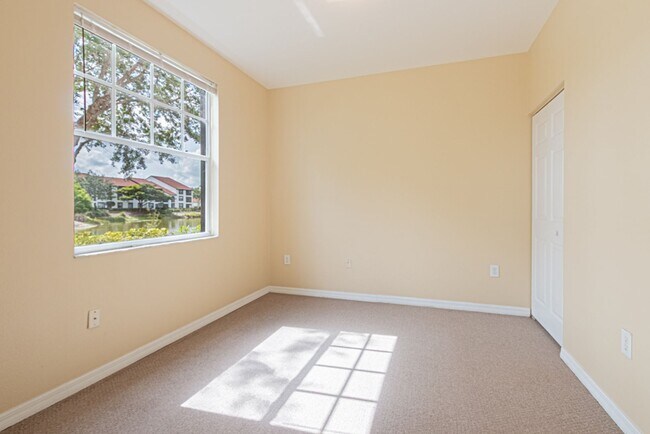 Building Photo - Ground-Level Comfort in North Naples – 2BR Condo in Fairway Preserve at Olde Cypress