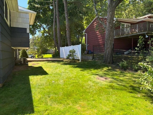Building Photo - Spacious 4-Bedroom Home with Functional Layout, Backyard Access & Attached Garage