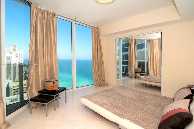 Building Photo - 17201 Collins Ave