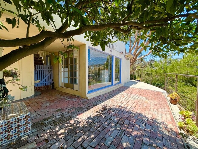 Building Photo - Excellent two Story Spanish style home located just minutes away from Sunset Strip