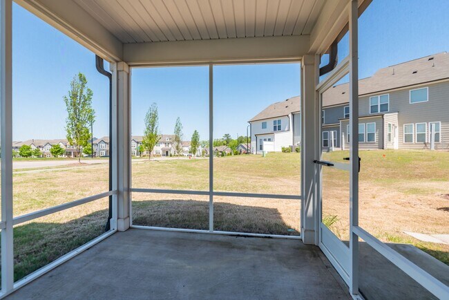 Building Photo - End unit townhome loaded with upgrades close to RTP! Available: Now