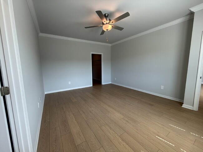 Building Photo - "NEWLY BUILT- Spacious 4-Bedroom Haven with Granite Elegance and Cozy Fireplace in Harvest"