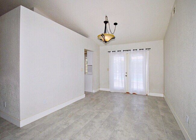 Building Photo - "Charming Oasis: 3-Bedroom Cathedral City Retreat with Pool, Fireplace, and Granite Kitchen!"