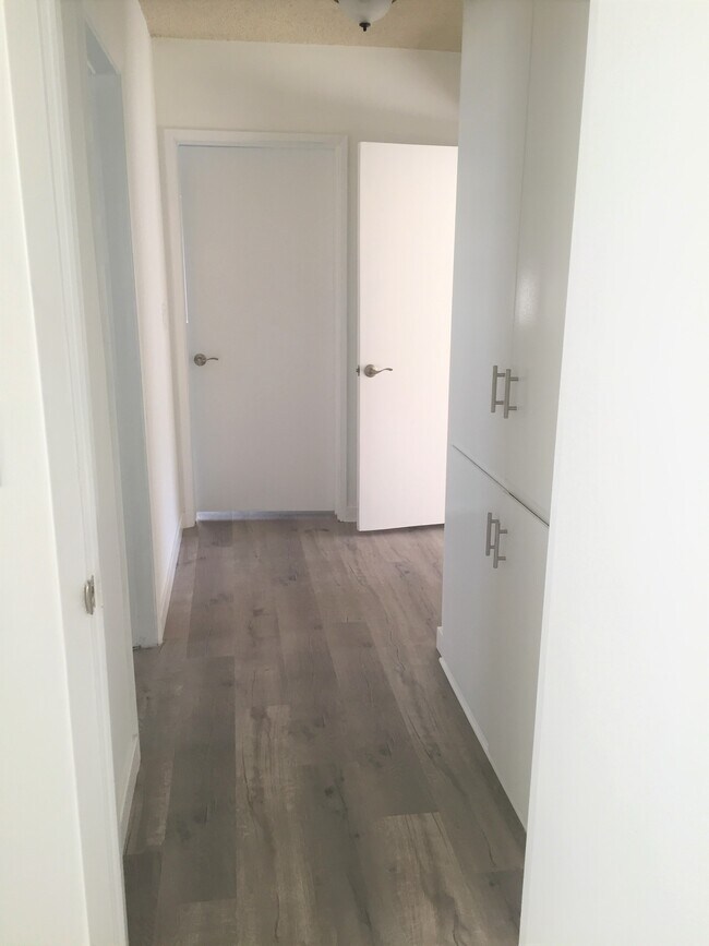 Actual hallway before staging - 1611 Brockton Ave