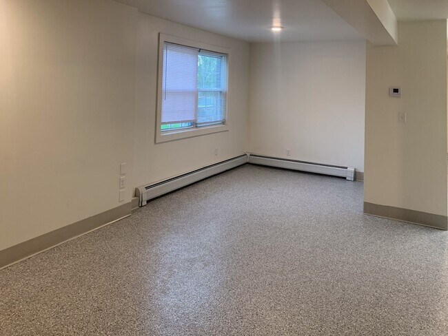 Building Photo - Spacious 3-Bedroom Apartment Near UVM with Private Entrance & Parking