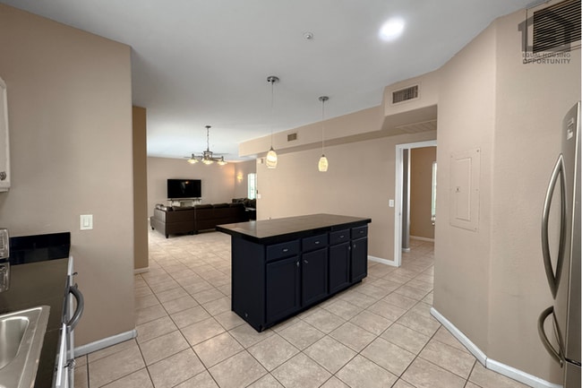 Building Photo - 3Bed/2.5Bath Condo at Priest Dr/Rio Salado Pkwy! -- ATTACHED 3-CAR GARAGE!