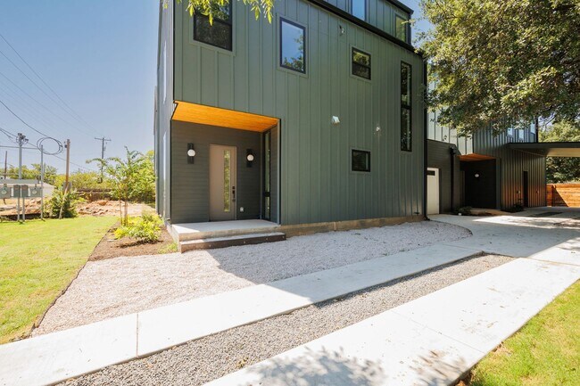 Building Photo - Luxury Redefined: Experience Vibrant Living in this 3-Bedroom Haven in East Austin