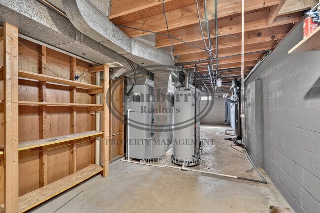 Building Photo - 6946 Kinsman Dr