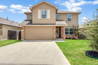 Building Photo - "Spacious 5-Bedroom Sanctuary with 2.5 Bat...