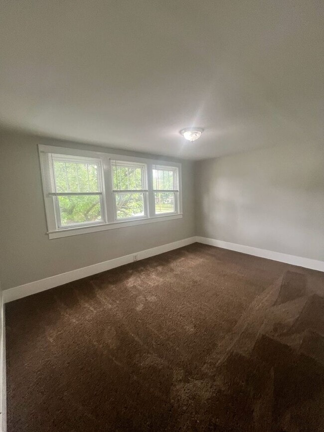 Building Photo - Three Bedroom House W/ Full unfinished Basement