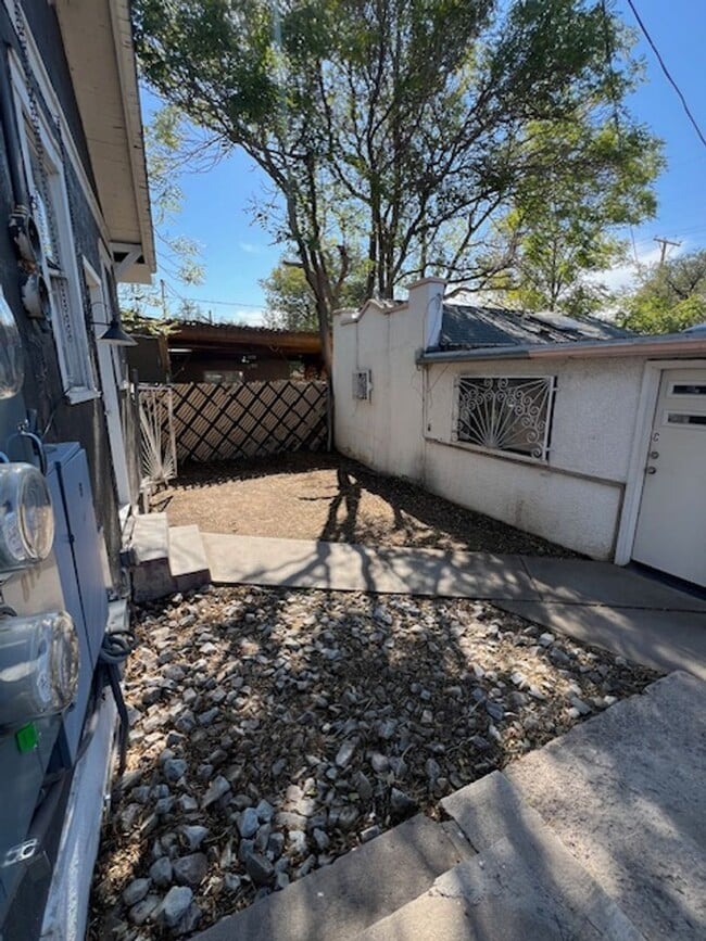 Building Photo - Can’t get any closer to Downtown Albuquerque, two bedroom one bath duplex