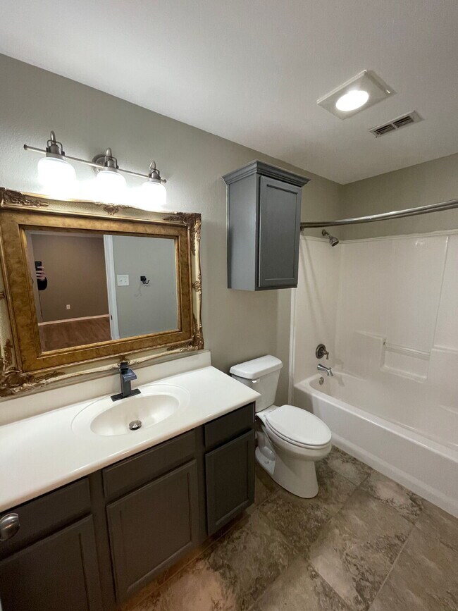 Building Photo - Stunning 3 Bedroom with Hard Surface Flooring Throughout!