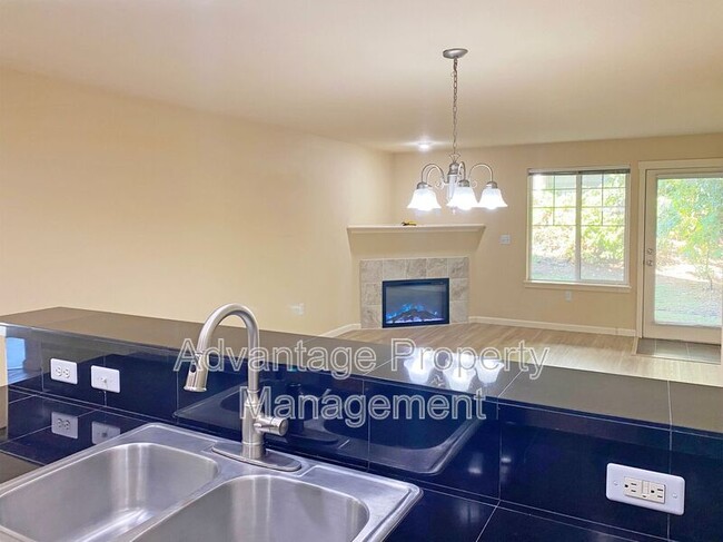 Building Photo - 6298 SW Grand Oaks Dr