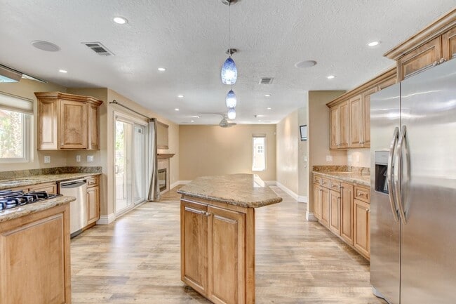 Building Photo - Gorgeous 4 Bedroom, 2 Story Home with a Beautiful Pool in the Lakes!