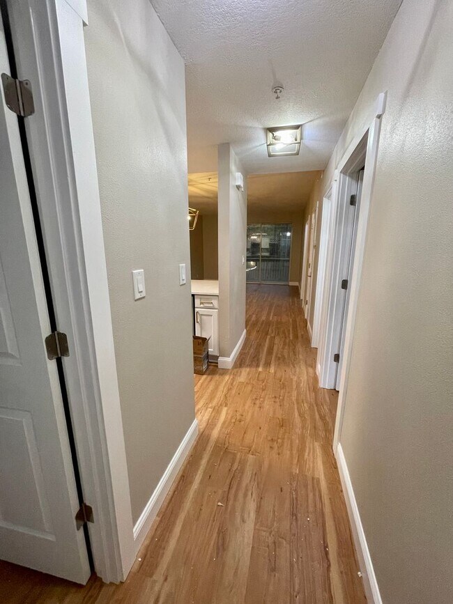 Building Photo - Fully Renovated 2B/2B condo located behind...