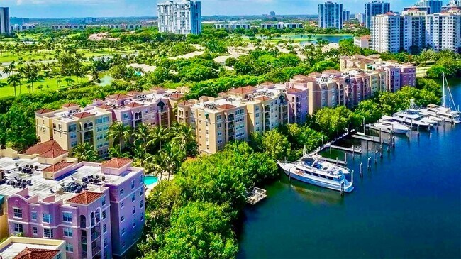Building Photo - Spacious 1-bed, 1-bath condo is nestled in the gated waterfront community of The Yacht Club at Av...