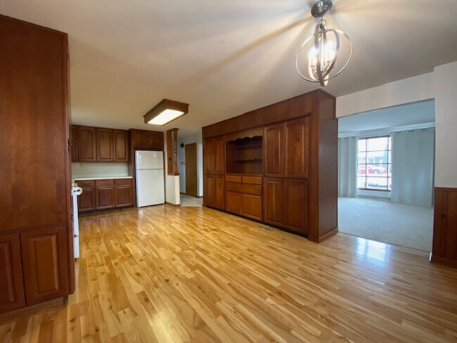 Building Photo - Welcome to this charming three-bedroom, tw...