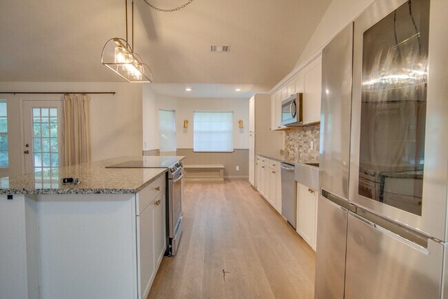Building Photo - West Pensacola 3BR, 2BA Brick Home Near NAS Pensacola with Screened Porch, Spacious Kitchen & Ope...