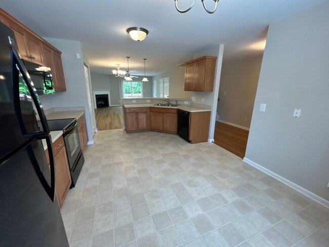 Building Photo - 4 Bedroom | 3.5 Bedroom Raleigh Townhome