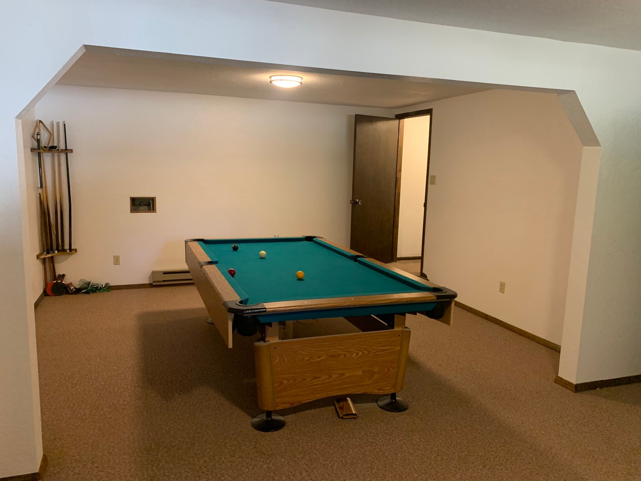 Pool room in basement - 805 N Austin St