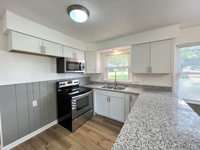 Building Photo - Fully Remodeled Brick Home W/ BIg Yard