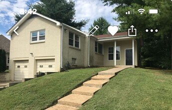 Building Photo - Ranch style four bedroom two bath with ful...