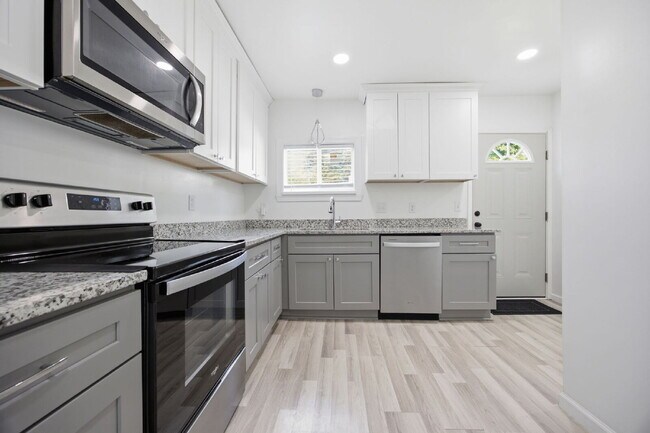 Building Photo - Freshly Renovated Ranch with a Spacious Fenced Yard
