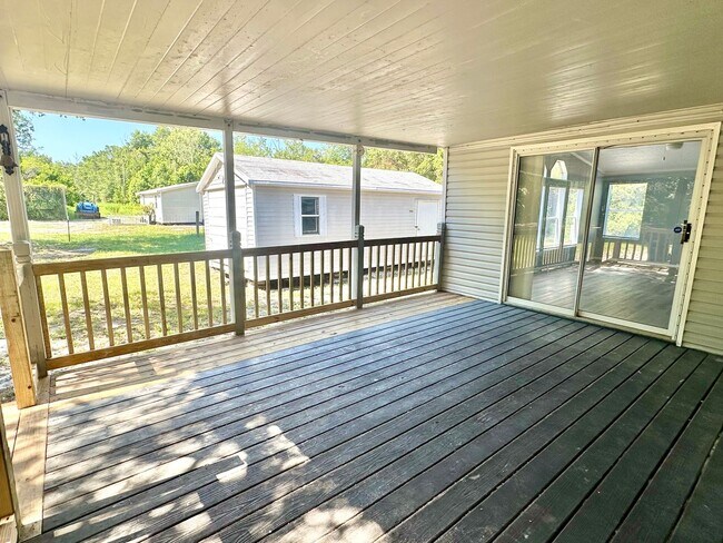 Building Photo - Privacy and Space in this 3/2 Home at the ...