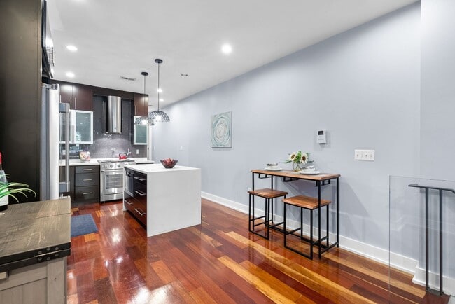 Building Photo - Stylish 2-Level Condo with Private Yard & Chef’s Kitchen Near Petworth Metro!