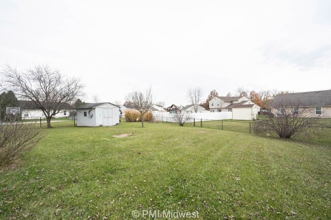 Building Photo - "Charming 4-Bedroom Retreat with Spacious ...