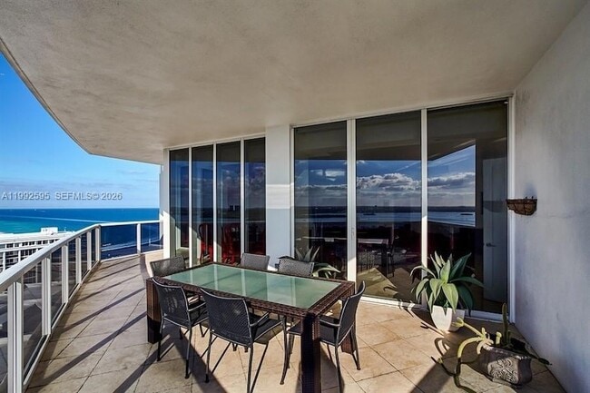 Building Photo - 10225 Collins Ave