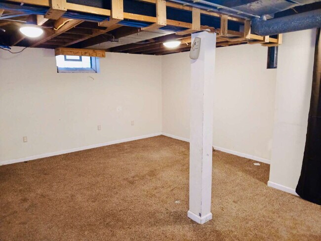 Building Photo - Charming 3-Bed, 2-Bath Gem on Woodbine Street – Cozy Comfort in 850 Sq Ft!