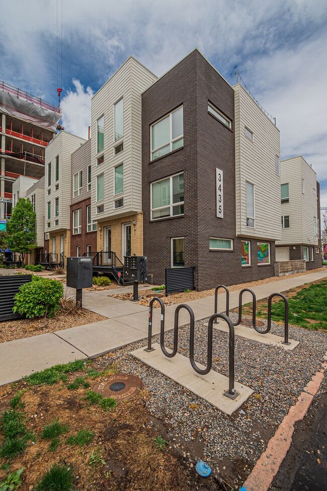 Building Photo - Modern 2BD, 3BA RiNo Townhome with Garage and Rooftop Deck