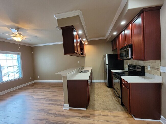 Building Photo - 3 Bedroom town home for rent August 6, 2026 in gated community with pool, renting for $1550 per m...