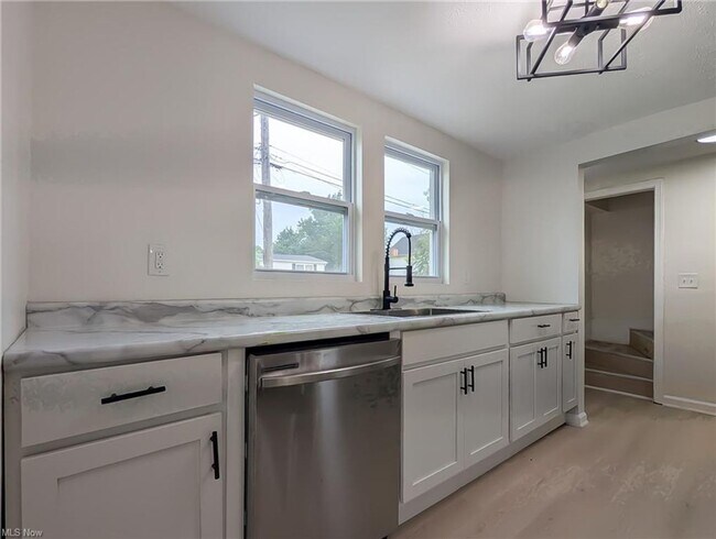 Building Photo - A Fresh Start on a Quiet Street – Everything new for you plus half off first months rent is waiting!