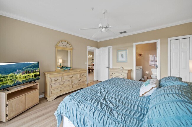 Building Photo - first-floor unit featuring a 2 bedroom, 2 bath fully furnished