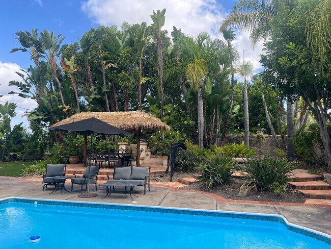 Building Photo - Stunning 4 bedroom Home with a Pool locate...