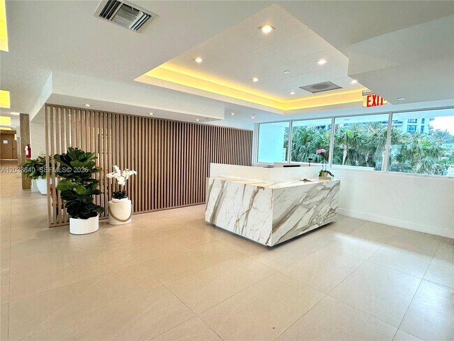 Building Photo - 5900 Collins Ave
