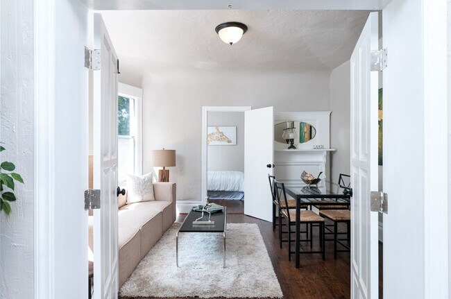 Small bedroom looking into living/dining and beyond that large bedroom - 2912 Harper Street