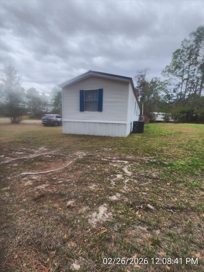 Building Photo - 19 Whispering Pines Cir