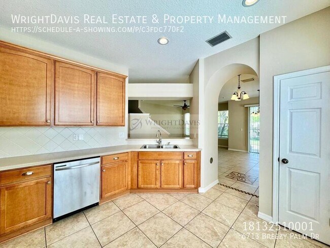 Building Photo - 6713 Breezy Palm Dr